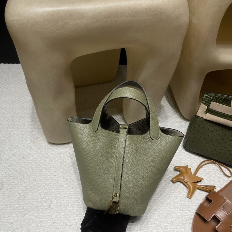 H**mes shopping bags